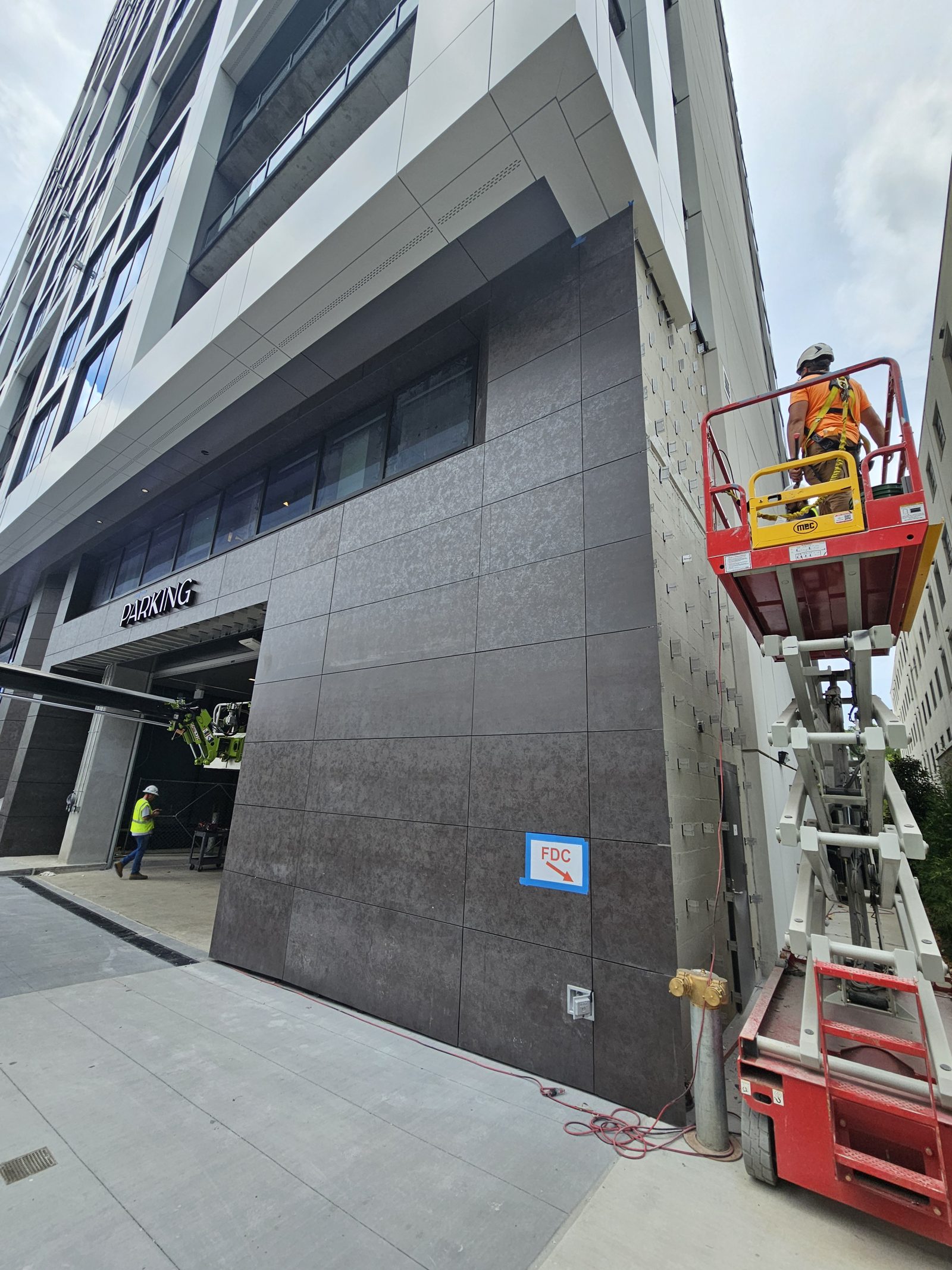 Installing large-format porcelain panels — W Peachtree, Atlanta